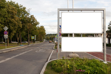 Billboard next to a track in a park, close-up.