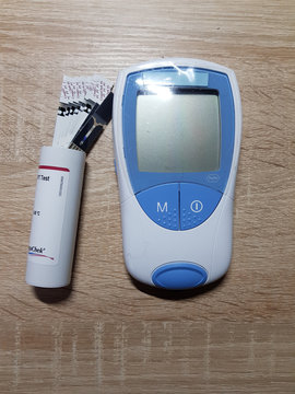 HEILIGENHAUS, NRW, GERMANY - NOVEMBER 30, 2018: Coagulation Self Management with the CoaguChek. Medical device for the determination and monitoring of blood clotting.