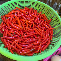 red chili peppers in basket
