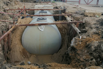 Gray building waste collection tanks are currently