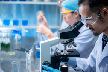 Researcher team and the development of antiretroviral drugs in a chemical laboratory