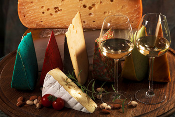 Elite variety of cheese on wooden background