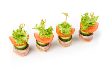 Snack canapes to the buffet on a white background