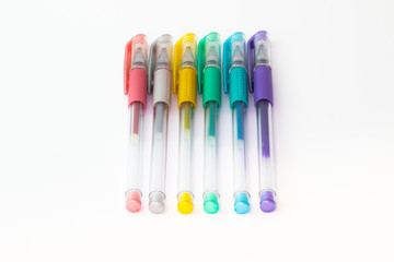 Set of color plastic gel pens with metallic colors, isolated on white background