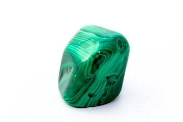 A sample of the mineral malachite on a white background