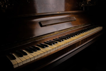 Fototapeta na wymiar Traditional classical wooden wall piano