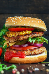 burger, meat cutlet beef steak, tomato, sauce and lettuce tasty meat snack sandwich menu concept. food background. top view. copy space