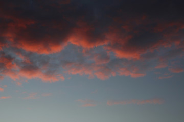 Naklejka na ściany i meble Nuvole rosse al tramonto