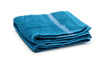 Blue terry towel isolated on a white.