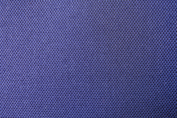 Naklejka na ściany i meble Close up shot of midnight dark blue formal suit cloth textile surface. wool fabric texture for important luxury evening or night event. Wallpaper and background with copy space for text