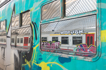 graffiti on the train in a station hall