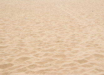 Fototapeta na wymiar sand texture pattern of empty beach in the summer 