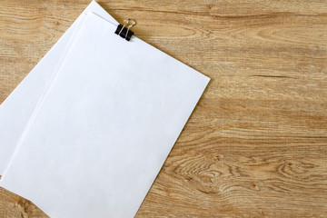 blank paper on wooden table