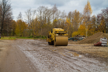 Construction of a new road. Roller for asphalting. Earthwork.