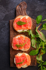 sandwich salmon smorrebrod delicious snack seafood fish, pescatarian menu concept. food background. top view. copy space