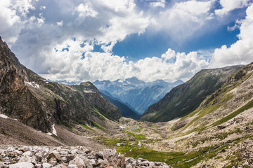 Fototapeta na wymiar Alpine meadows and rocks in the Caucasus mountains in Russia