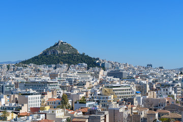 Athens cityscape from Anafiotika with Lycabettus hill in the background