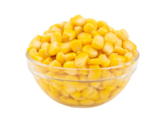 Canned corn seeds in glass bowl isolated on white background