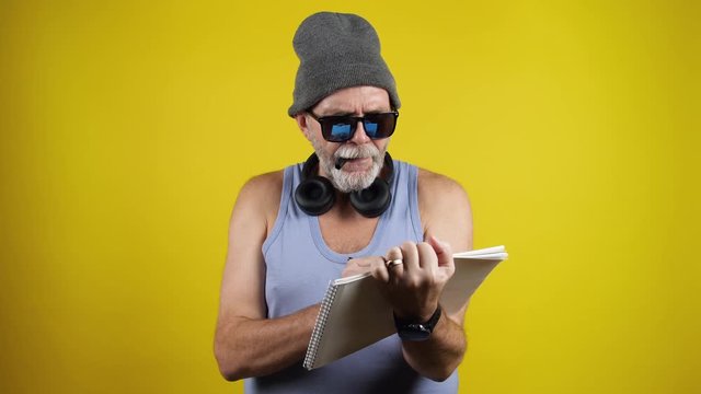 Cool mature man write phrase Be Yourself