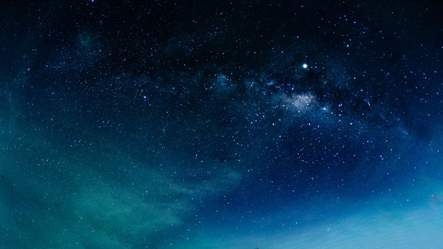 Milky way galaxy with stars and space in the universe background at thailand