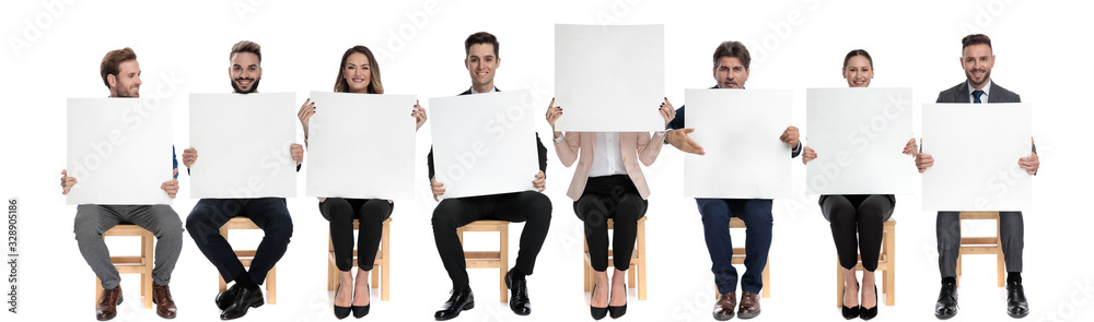 Canvas Prints Team of 8 businessmen holding empty billboards