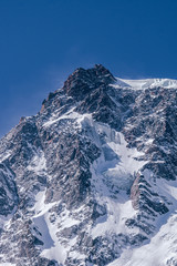 Monte Rosa, one of the most famous peaks of all the Alps, during a beautiful winter day, near the town of Macugnaga, Italy - March 2020.