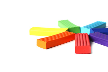 multi-colored plasticine on a white background. Educational games for children