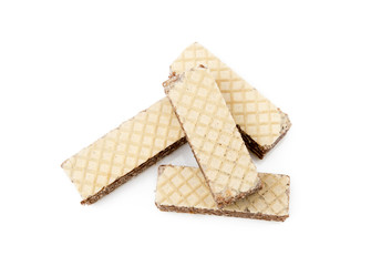 Crispy wafers with creamy hazelnut filling isolated on white background