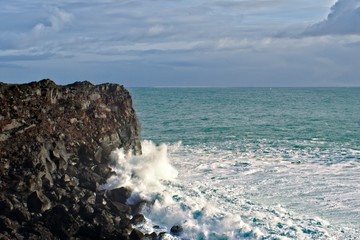 waves crashing on rocks
