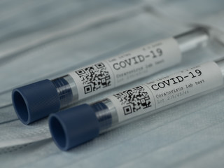 Test tube sample coronavirus test on background from face masks