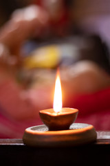 Fototapeta na wymiar Glowing clay lamp Happy diwali festive season