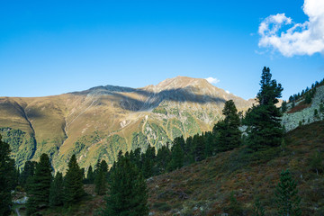 Mountains and peaks landscape covered with glaciers and snow, natural environment. Hiking in the Knapenweg, Tirol, Austria, Europe