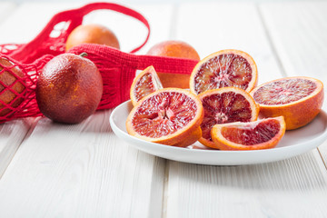 Sicilian red oranges on wooden background