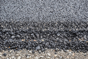 New fresh asphalt. edge of new road from the asphalt.