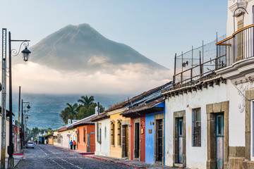 Old town in Antigua Guatemala with the volcano fire - obrazy, fototapety, plakaty