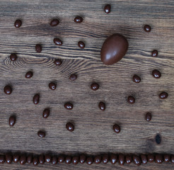 chocolate eggs on a natural wood texture