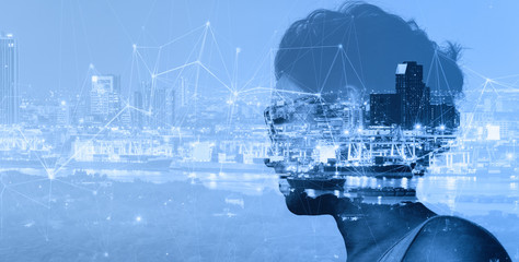 Double exposure of Smart entrepreneur woman looking at Global business connection technology interface global partner connection of Container Cargo freight ship.