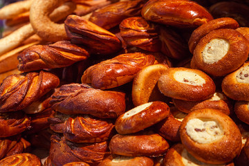 Hot sweet buns with sugar. Round cheese pies in the store