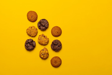 package set of various oat cookies flat lay isolated on the colorful background