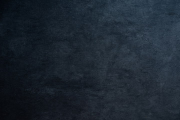 rough marbled stone background texture with gradient and copy space