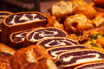 Sliced bread with poppy seeds on a shelf