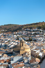 Fototapeta premium Beautiful village of Montefrio, Granada (Andalusia), Spain. Views of the town, the church (Iglesia de la Encarnación) and mountains.