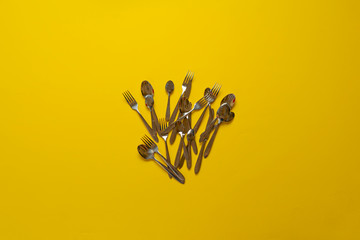 a bunch of the stainless steel kitchenware cutlery flat lay view from above