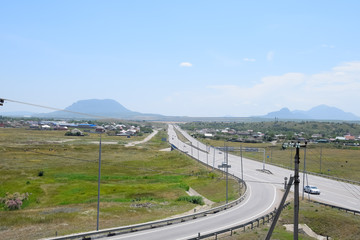The road crossing is adjacent to secondary road.