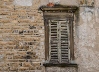 Fototapeta na wymiar Windows in Bergamo, Upper City, famous tourist destination in Lombardy, Italy.
