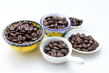 Colombian coffee beans, displayed in containers