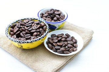 Colombian coffee beans, displayed in containers