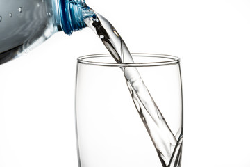 water flowing from bottle to glass	