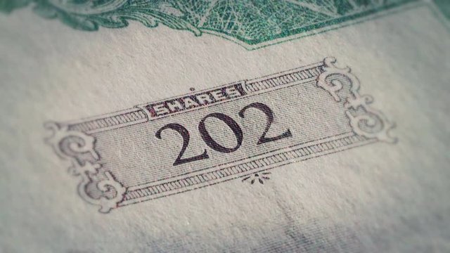 Share Certificate showing  stock ownership growth, filmed in 4K RAW