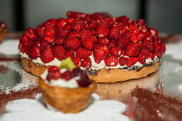 Strawberry cake, Fruit cake with vanilla cream, white flower sugar decoration